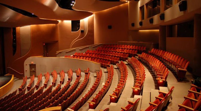 An auditorium with rows of seats.