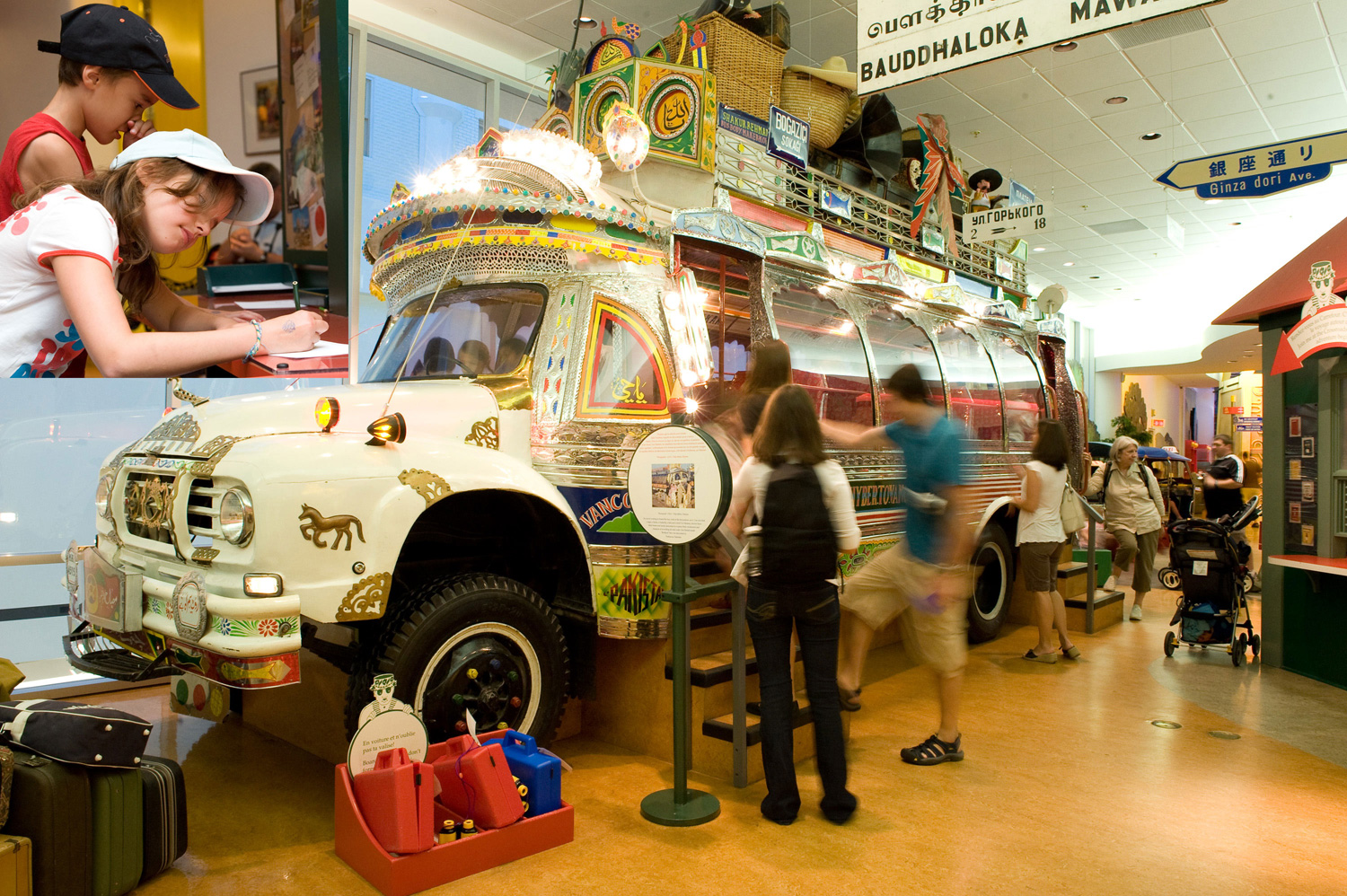 A group of people standing in front of a display of a bus in the Children's Museum