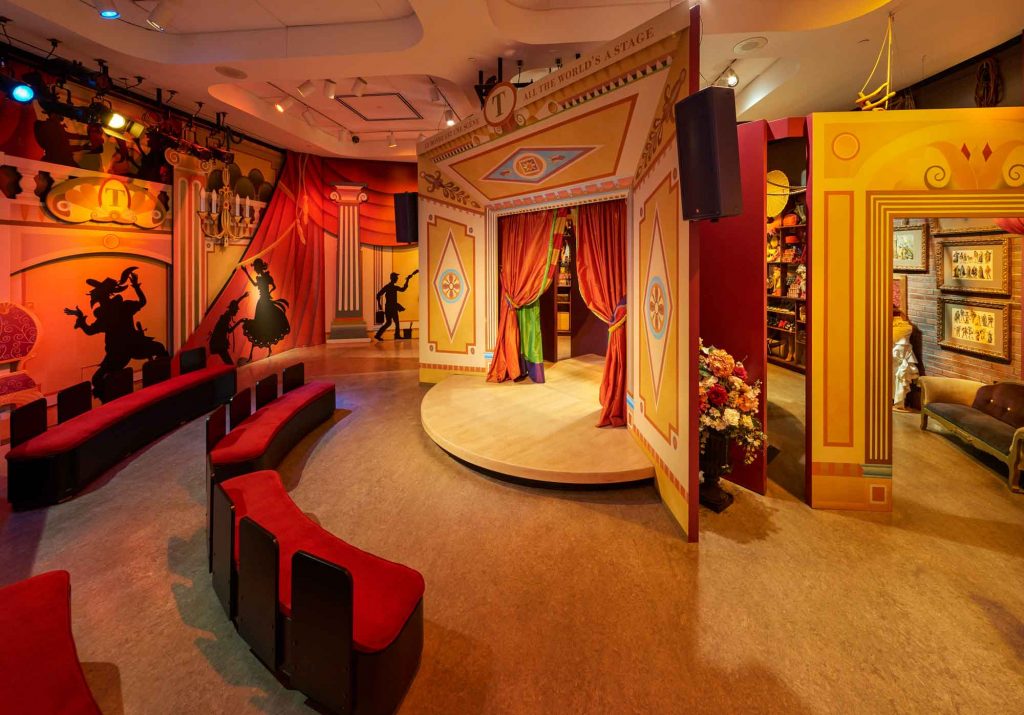 A room with a stage and red chairs located in the Canadian Museum of History in Ottawa.