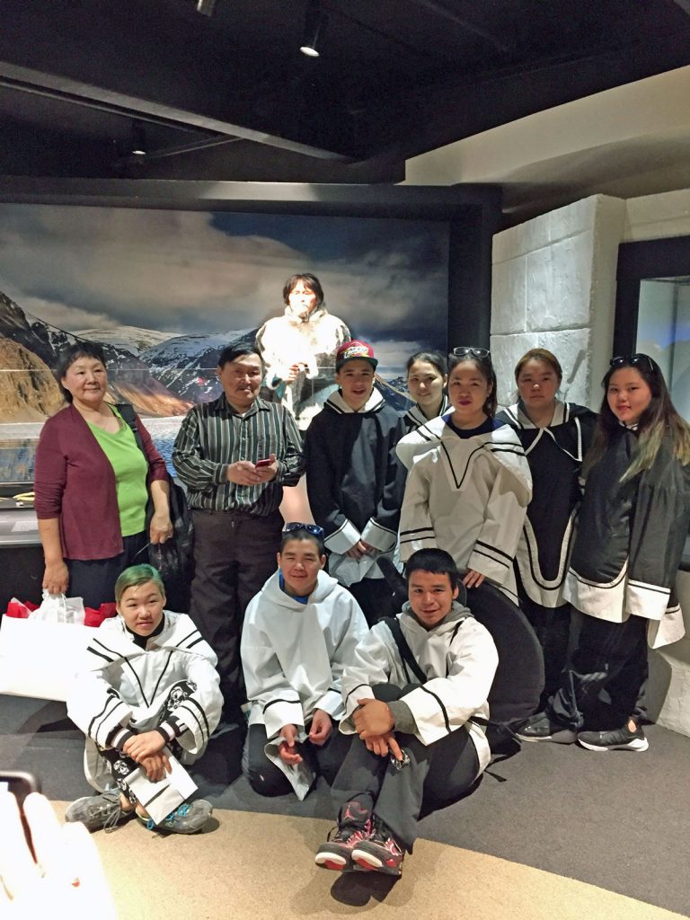 Members of the Arctic Bay community and the Inuit Heritage Trust attend a private unveiling ceremony in April 2017. Photo: Canadian Museum of History 