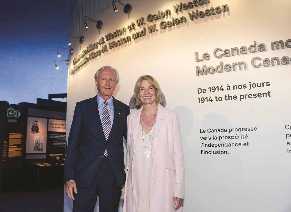 A man and woman standing in front of a display at the Canadian Museum of History in Ottawa.