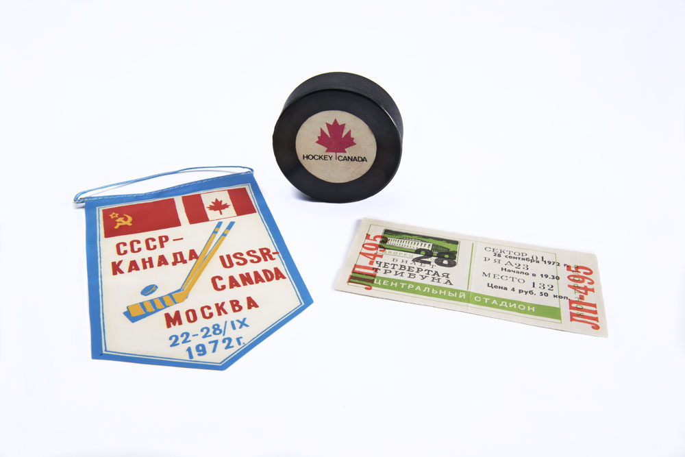 Souvenir banner, game ticket and puck from the 1972 Summit Series. Canadian Museum of History