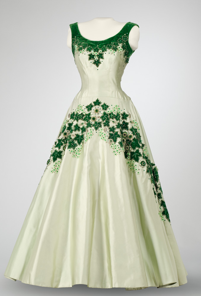 A white and green dress with green embroidery displayed at the Canadian Museum of History in Ottawa.