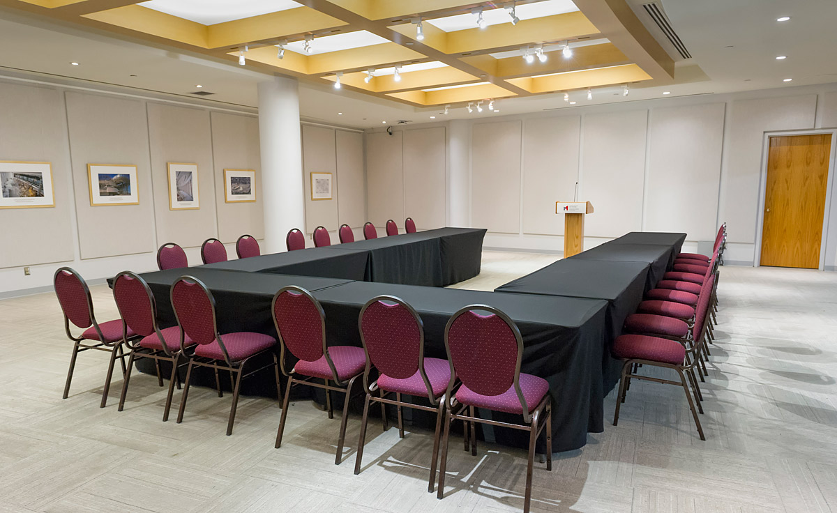 A conference room with a long table and chairs located in Ottawa at the Canadian Museum of History.