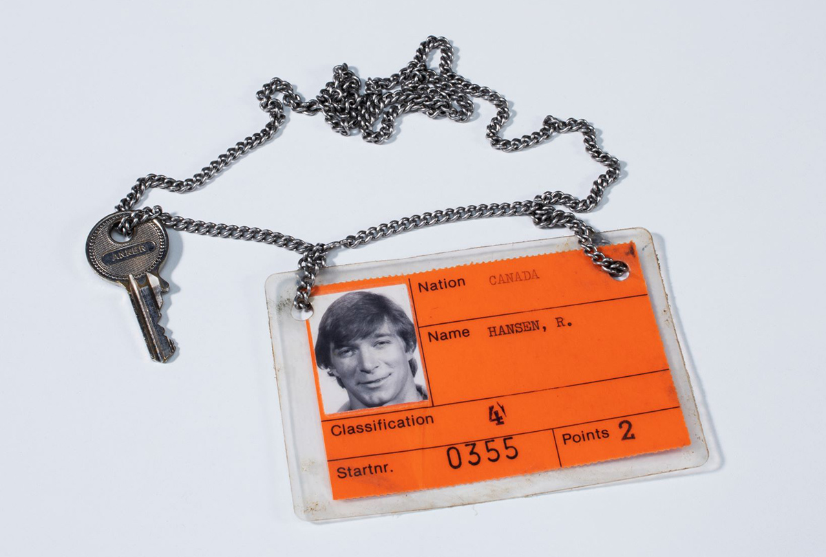 An orange id tag on a chain with a key displayed at the Canadian Museum of History in Ottawa.