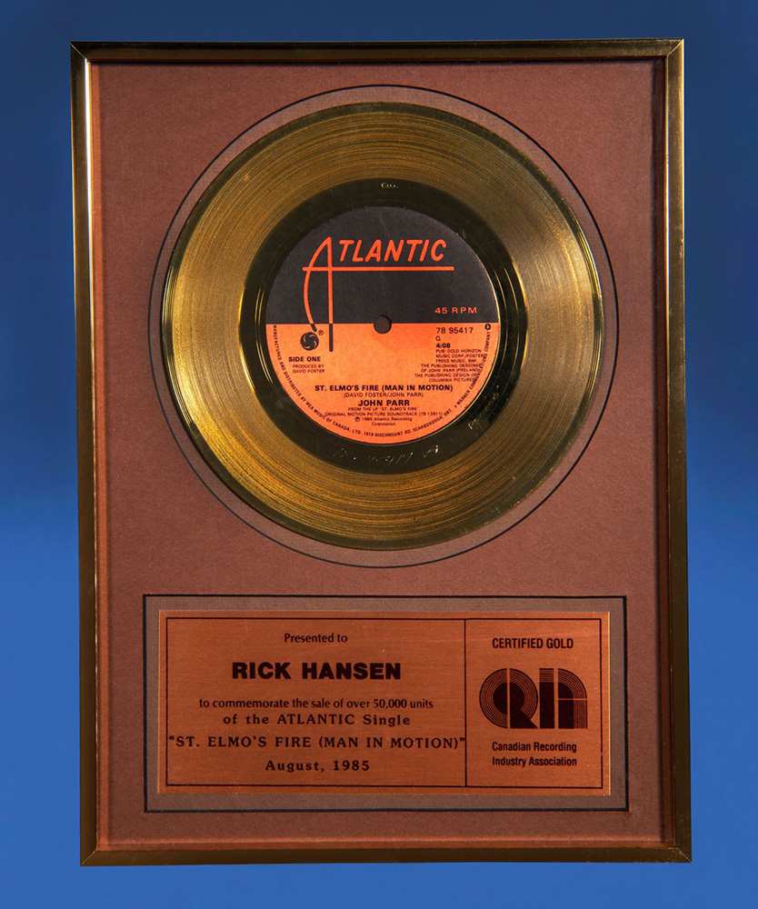 A gold record with the name ric harrison on it, displayed at the Canadian Museum of History in Ottawa.