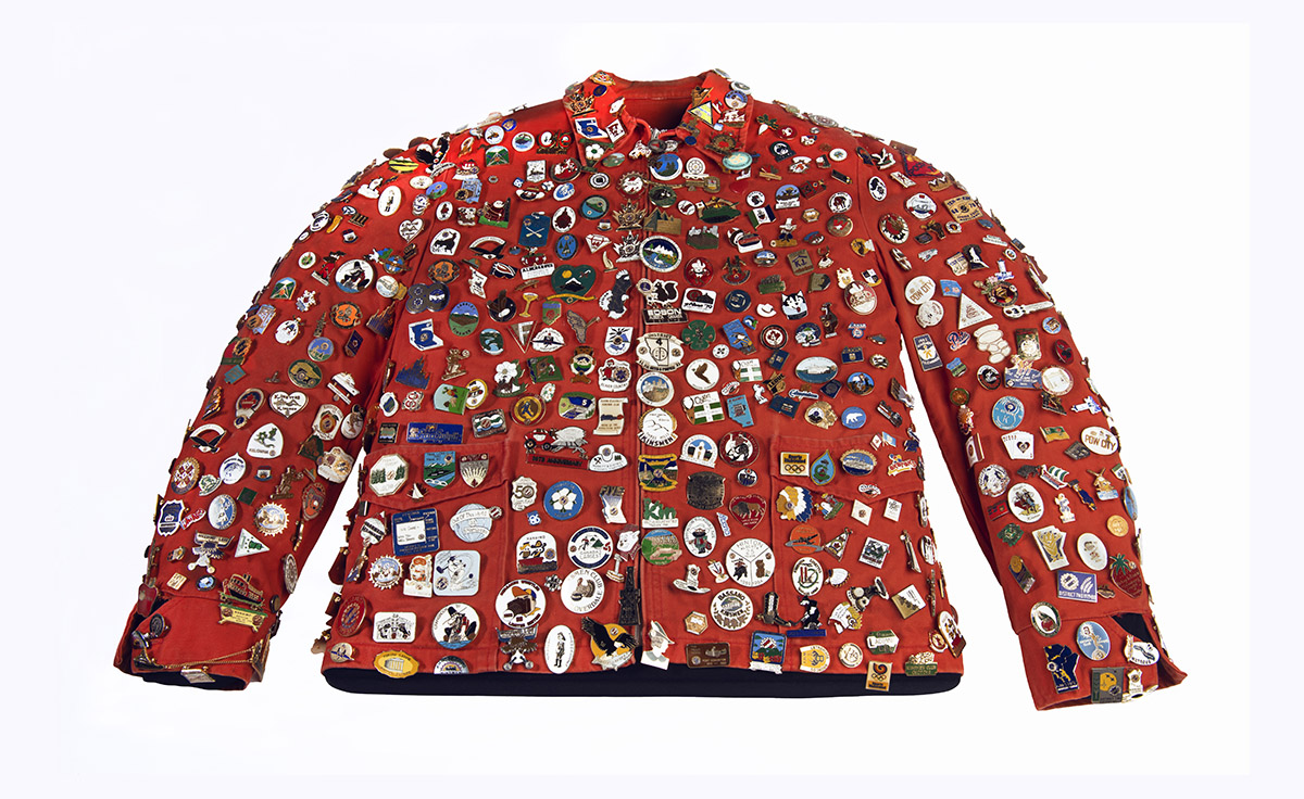 A red jacket with a lot of buttons on it displayed at the Canadian Museum of History in Ottawa.