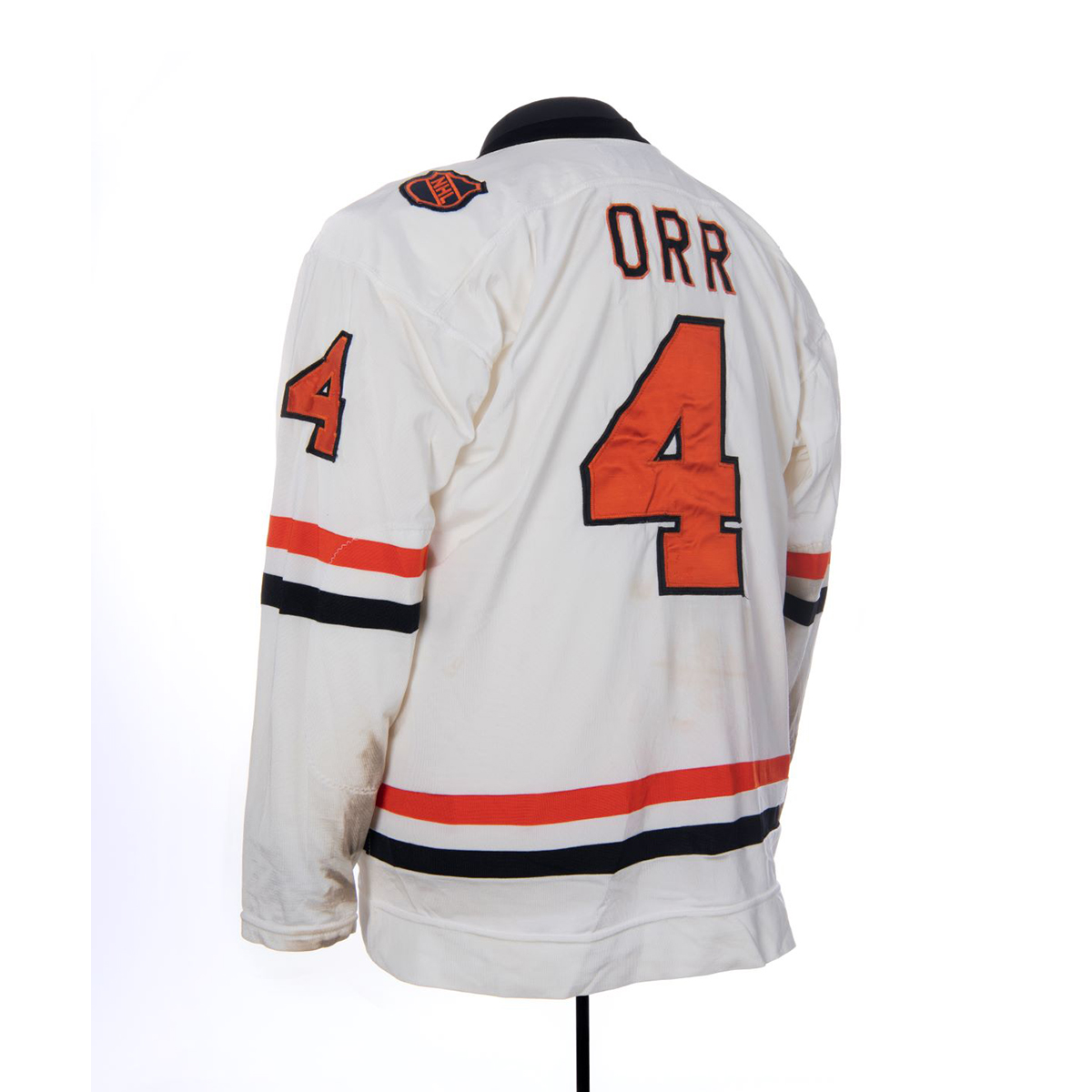 A hockey jersey with the number 4 on it, displayed at the Canadian Museum of History in Ottawa.