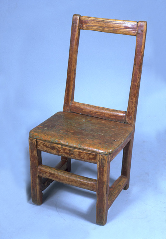 A wooden chair in the Canadian Museum of History.