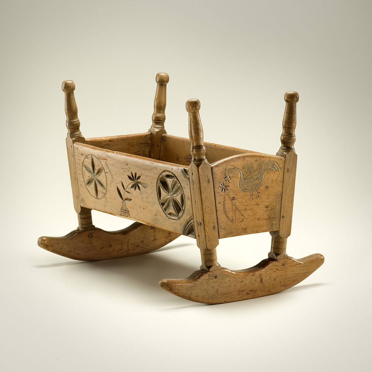 A wooden rocking chair displayed in the Canadian Museum of History, Ottawa.