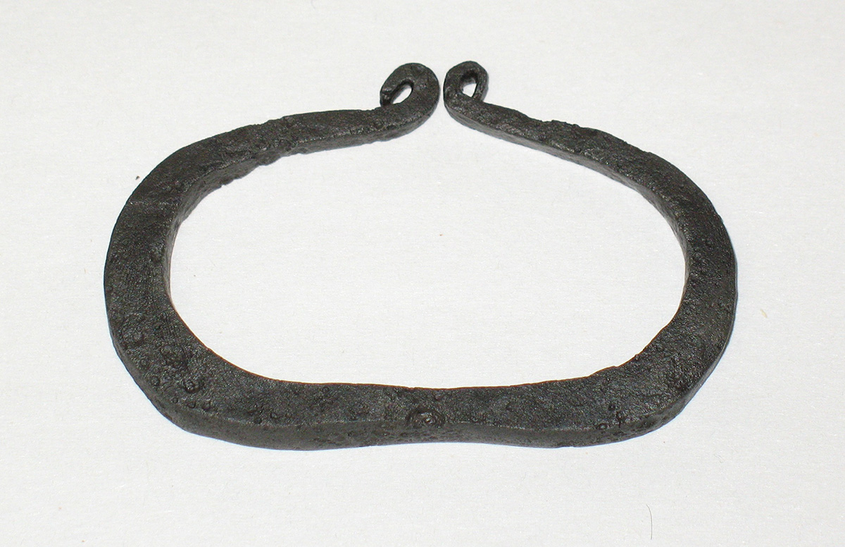 A black metal ring on a white surface at the Canadian Museum of History in Ottawa.