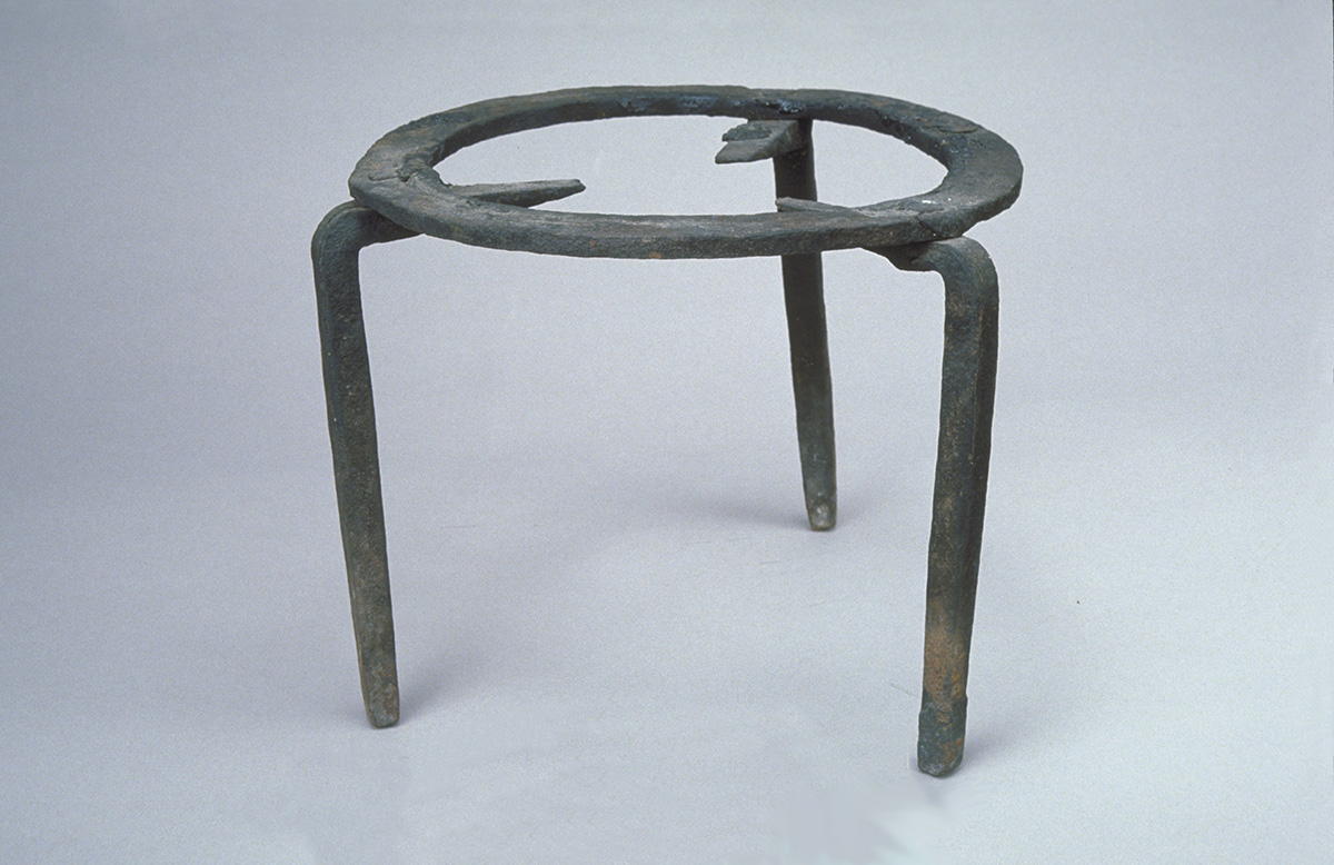 A metal stool with a circular top on display at the Canadian Museum of History in Ottawa.