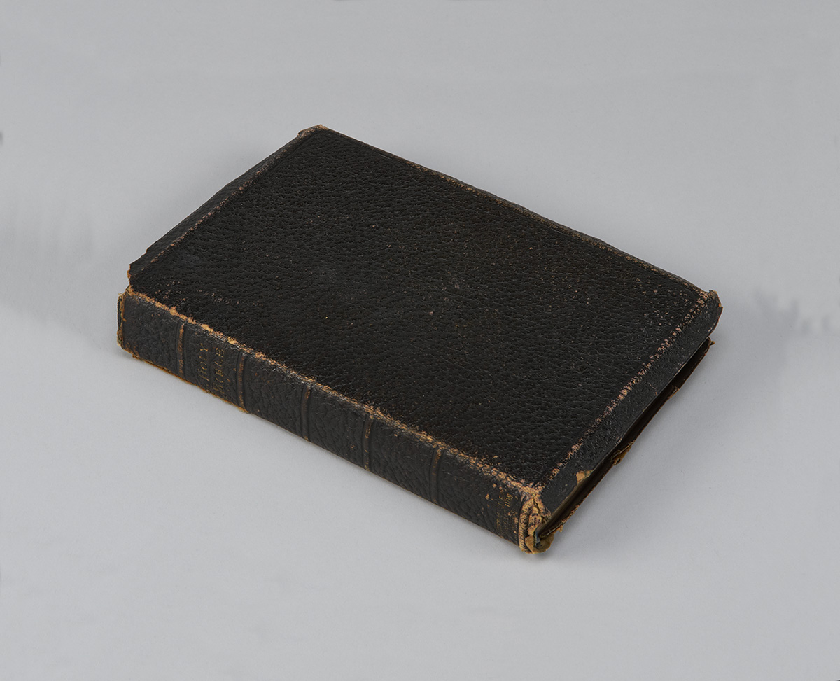 A black leather book on a white surface at the Canadian Museum of History in Ottawa.