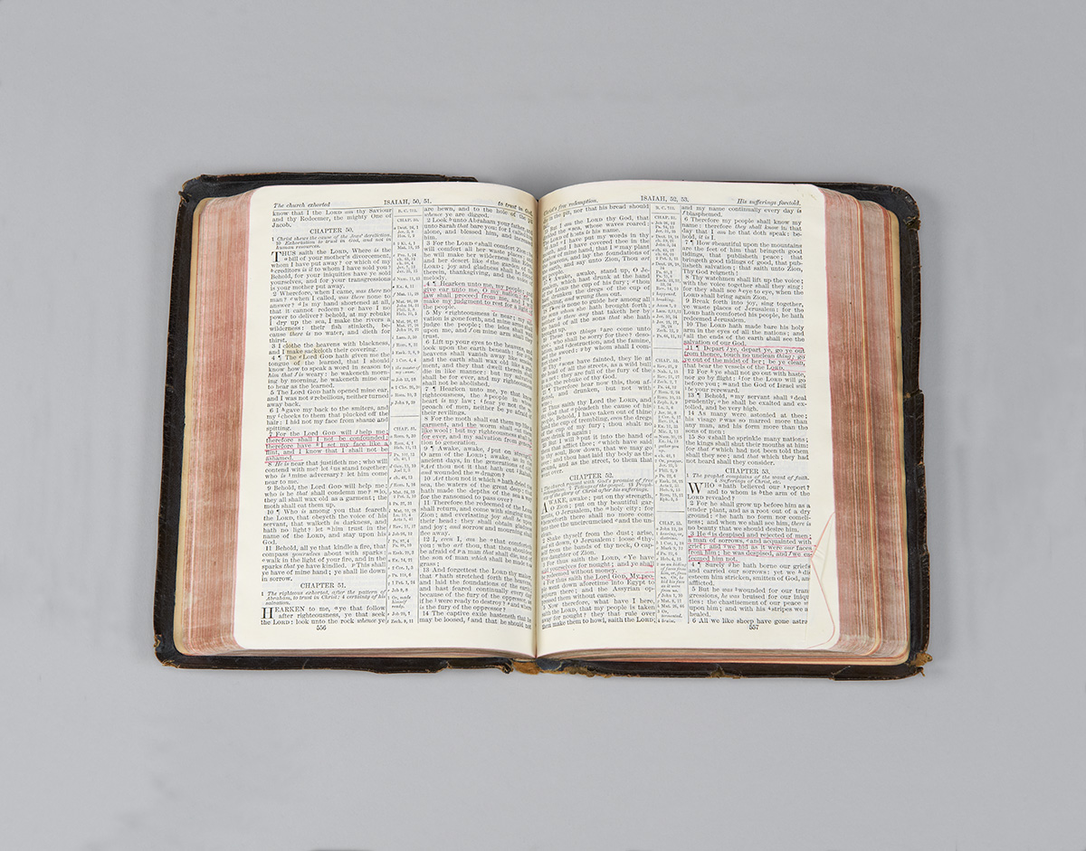 An open bible on a grey background at the Canadian Museum of History in Ottawa.