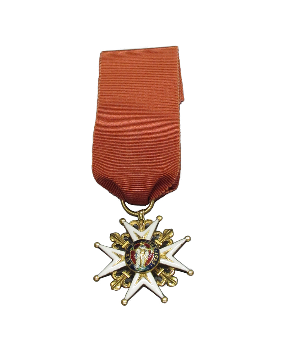 A medal with a star on it, showcased in the Canadian Museum of History.