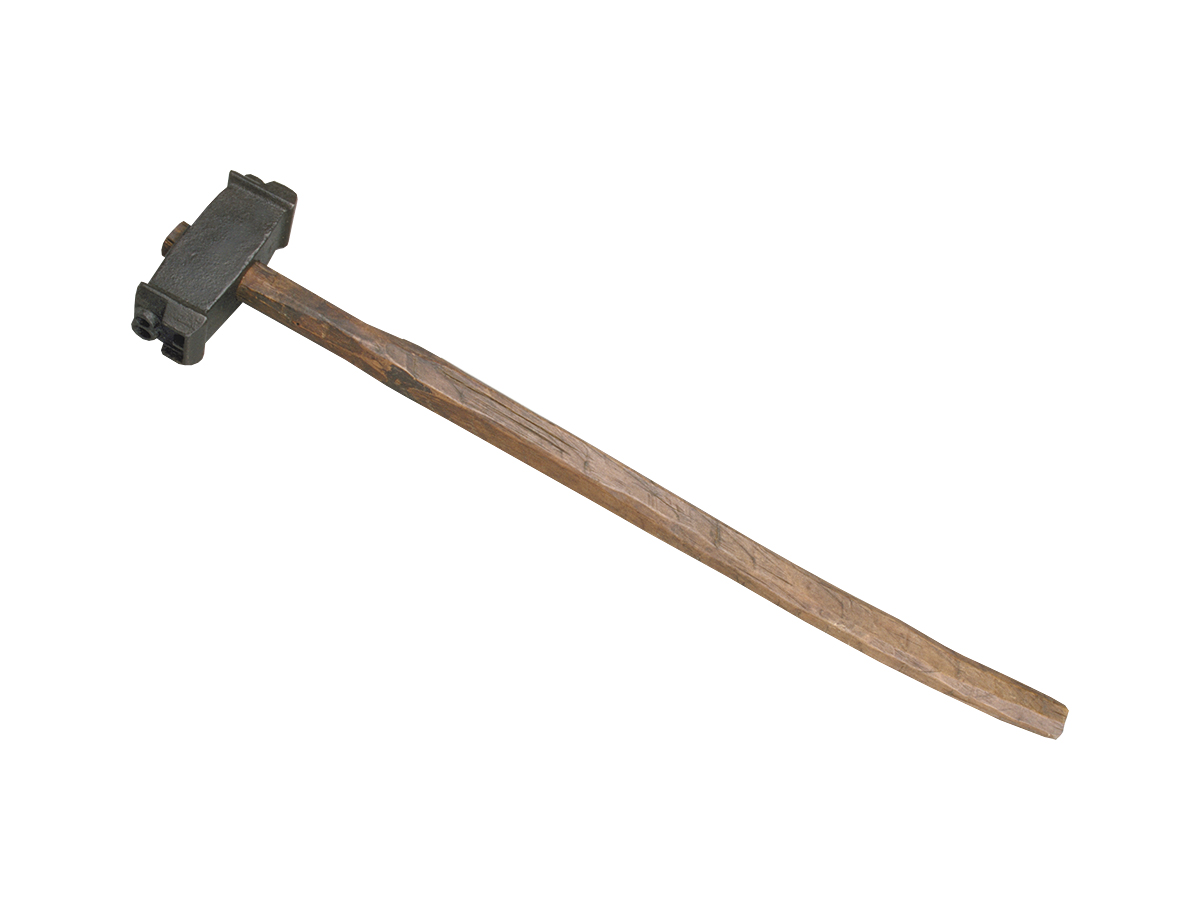 A hammer with a wooden handle displayed at the Canadian Museum of History in Ottawa.