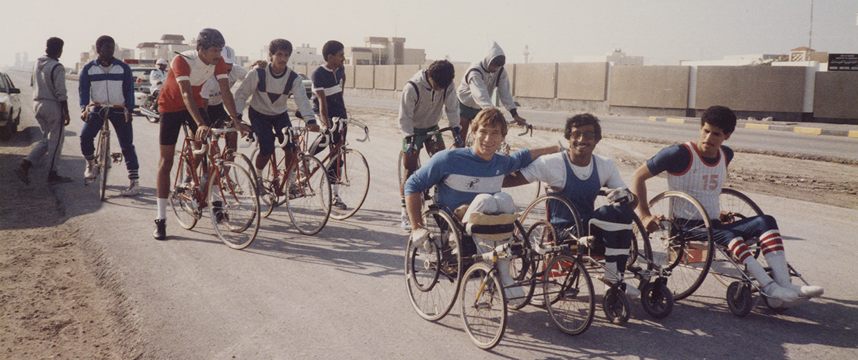 A group of people on bicycles enjoying a scenic ride in Ottawa near the Canadian Museum of History.