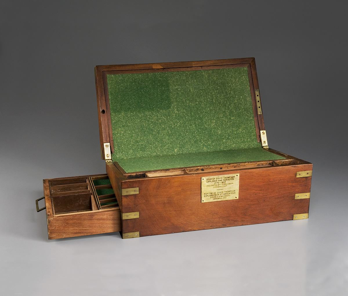 A wooden box with a green lid on display at the Canadian Museum of History in Ottawa.