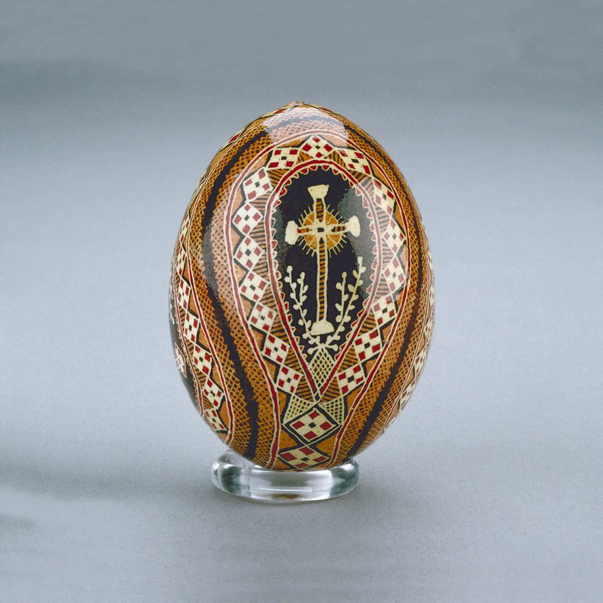 A wooden egg with a cross on it, displayed at the Canadian Museum of History in Ottawa.