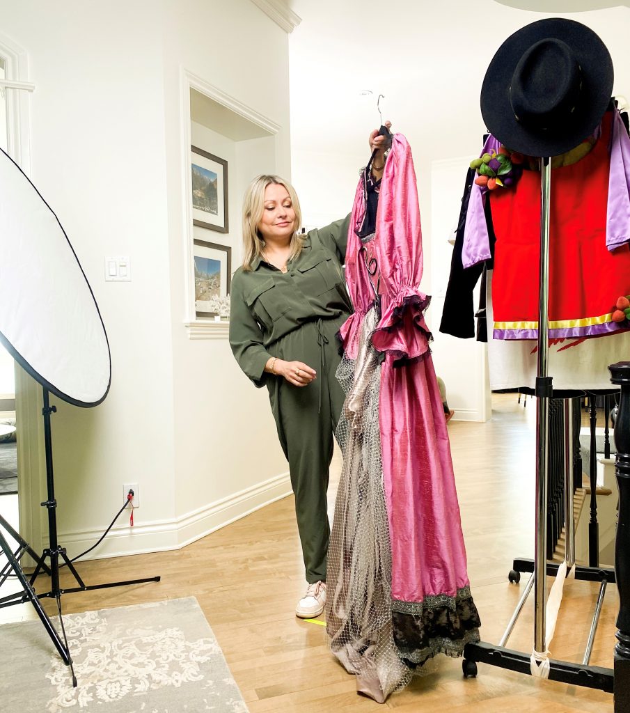 Mitsou Gélinas looking at her stage clothing.