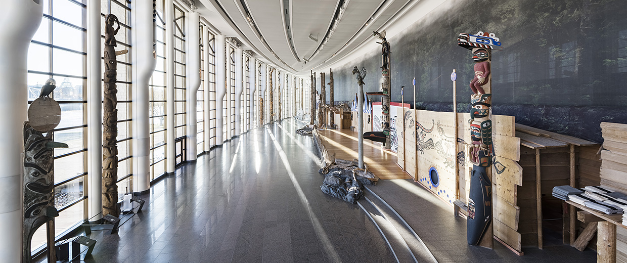 The interior of the Canadian Museum of History in Ottawa, featuring a plethora of wooden artifacts.