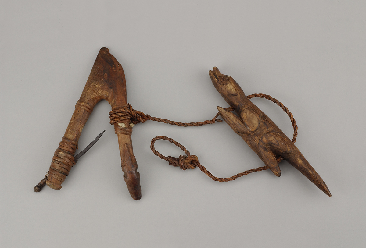 A pair of wooden tools with a rope attached to them showcased at the Canadian Museum of History in Ottawa.