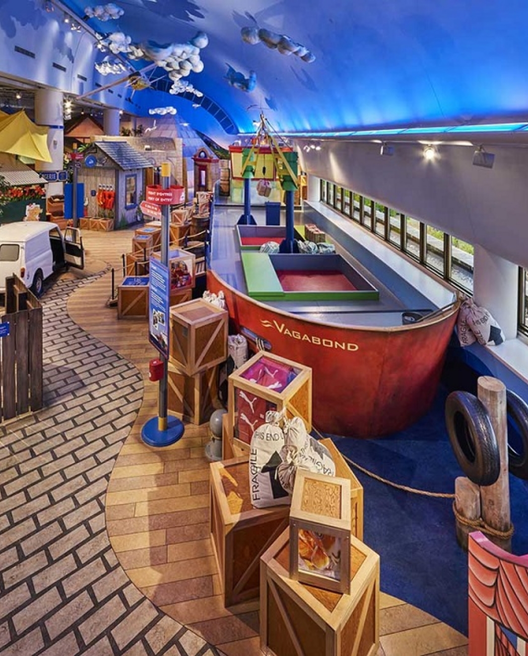 The Canadian Museum of History in Ottawa, featuring a children's museum with a unique boat exhibit on the ceiling.