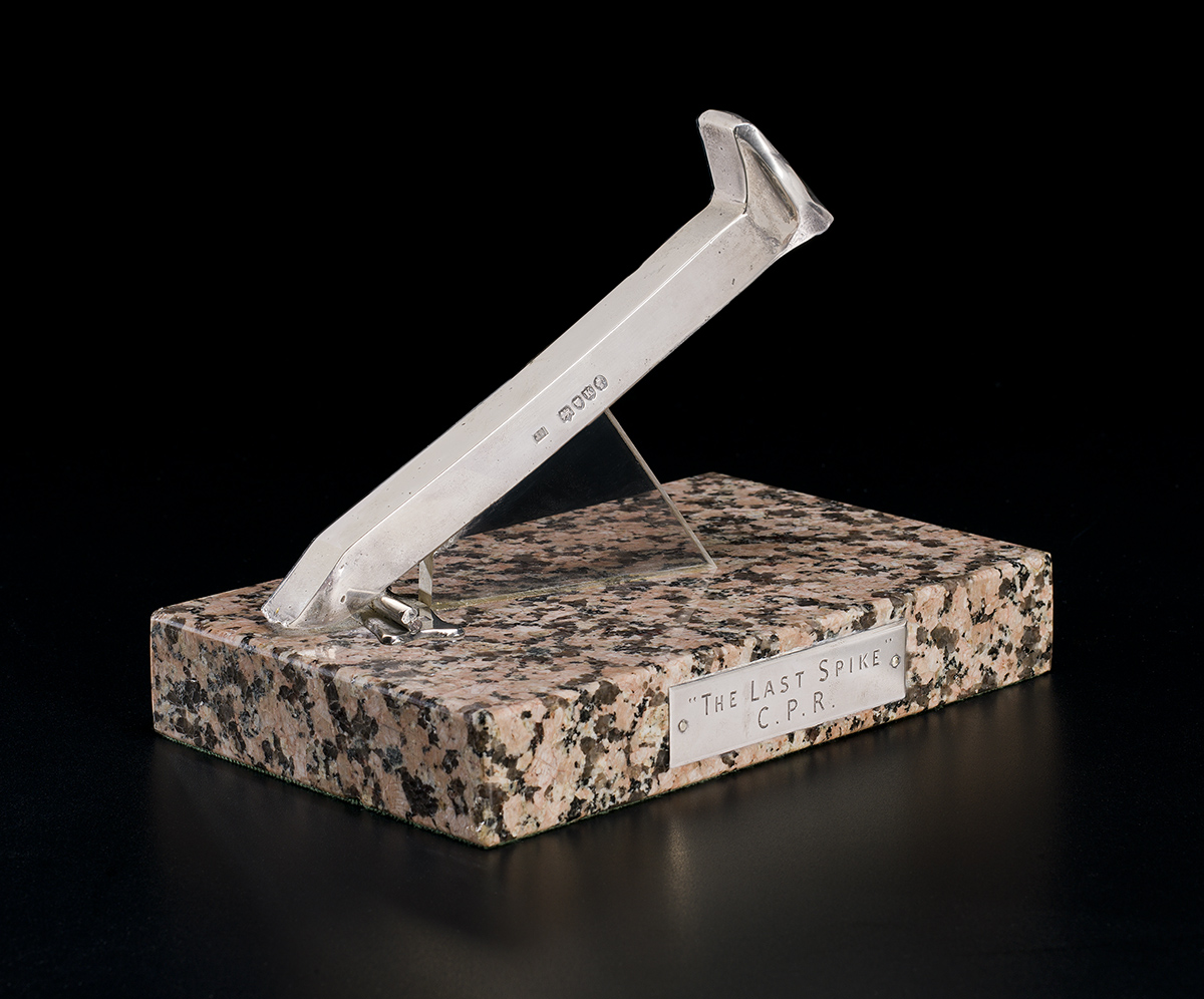 A statue of a knife on top of a marble base, located in the Canadian Museum of History in Ottawa.