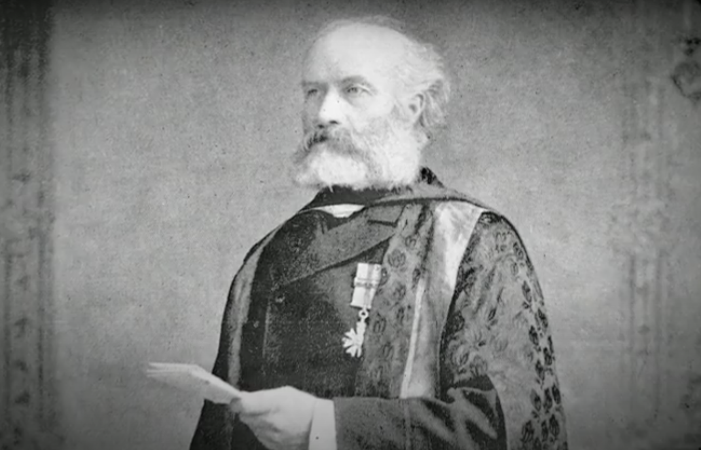 An old photo of a man with a beard and robes at the Canadian Museum of History in Ottawa.