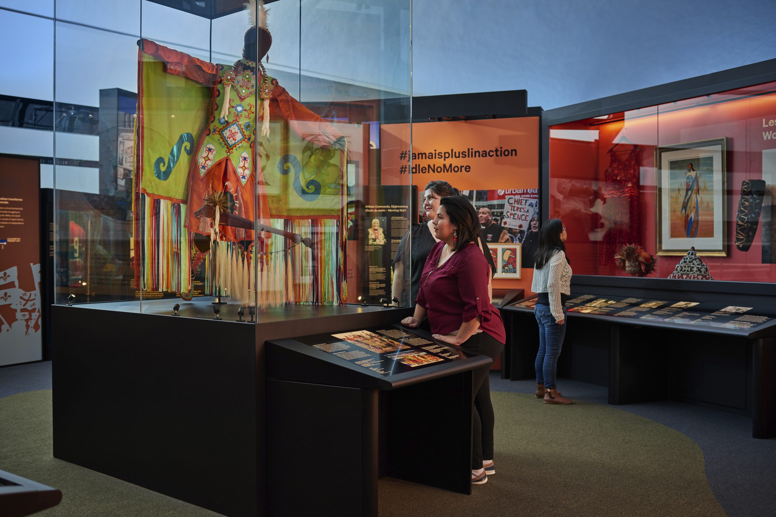 A woman looking at a display of artifacts in the Canadian Museum of History in Ottawa.