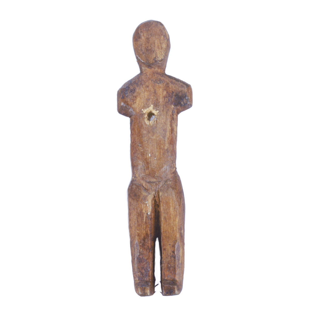 Description: A wooden figure of a man standing on a white background, displayed at the Canadian Museum of History in Ottawa.