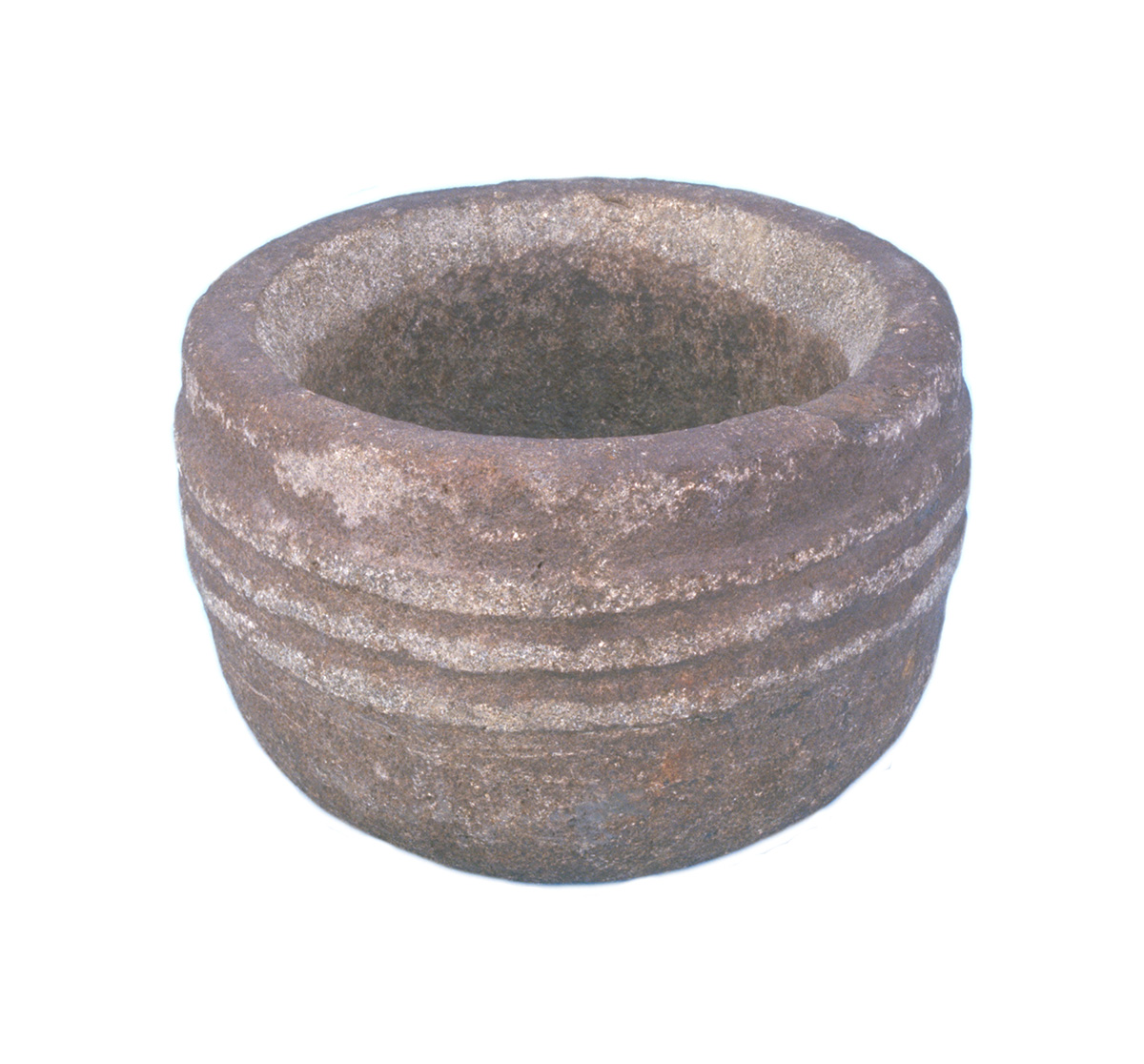 A round stone pot from the Canadian Museum of History on a white background.