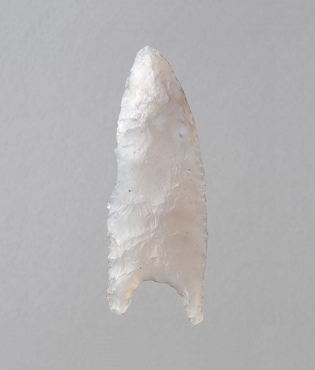 A white arrowhead on a gray background at the Canadian Museum of History in Ottawa.