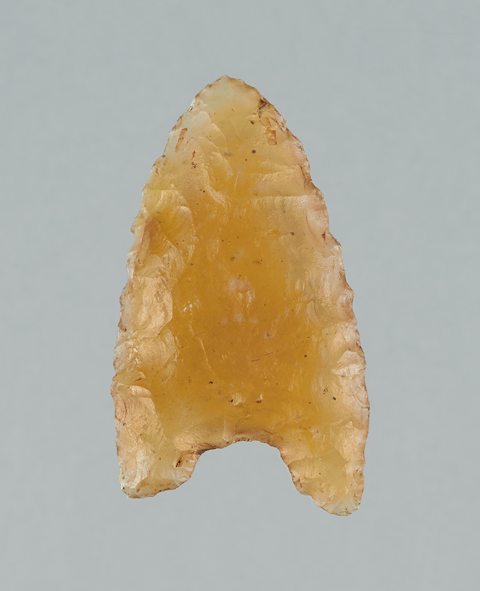 A yellow arrowhead on a gray background in Ottawa.