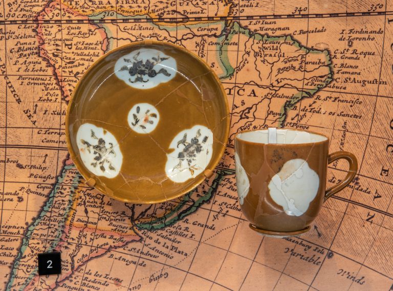 Chinese export porcelain cup and saucer in a style known as Batavian ware.